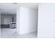 The bright hallway connects other areas and has an easily maintained tile floor at 30376 Armenia Rd, Leesburg, FL 34748