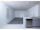 Spacious and bright area offering a large kitchen and living area with ample natural light at 30376 Armenia Rd, Leesburg, FL 34748