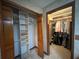 Bathroom featuring a vanity, mirror, and closet space at 3725 Blossom St, Kissimmee, FL 34746