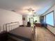 Spacious primary bedroom with attached office space and ample natural light at 3725 Blossom St, Kissimmee, FL 34746