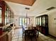 Dining room with hardwood furniture and an outdoor view at 3725 Blossom St, Kissimmee, FL 34746