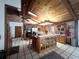 Open kitchen featuring wood cabinets, tile flooring, and a central kitchen island at 3725 Blossom St, Kissimmee, FL 34746