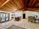 Bright and airy living area with wood ceilings, skylights, and tile flooring at 3725 Blossom St, Kissimmee, FL 34746