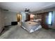 Main bedroom with a ceiling fan and carpet flooring at 3725 Blossom St, Kissimmee, FL 34746