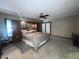 Main bedroom with a ceiling fan and carpet flooring at 3725 Blossom St, Kissimmee, FL 34746
