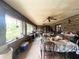 Enclosed patio with brick walls, tile floors, ceiling fans, and furniture at 3725 Blossom St, Kissimmee, FL 34746