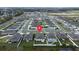 Community aerial view shows neighborhood layout, home location, and nearby roads at 381 Singing Sands Cir, Lake Wales, FL 33859