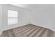 Bright bedroom featuring plush carpeting and a window with natural light at 381 Singing Sands Cir, Lake Wales, FL 33859