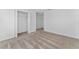 Bright bedroom featuring neutral carpet and a large closet at 381 Singing Sands Cir, Lake Wales, FL 33859