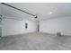 Spacious garage with ample space for vehicles and storage at 381 Singing Sands Cir, Lake Wales, FL 33859