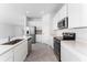 Bright kitchen with stainless steel appliances, white countertops, and an open design at 381 Singing Sands Cir, Lake Wales, FL 33859