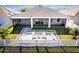 Charming backyard patio with a white picket fence creating a private and relaxing outdoor space at 3848 Cabo Rojo Dr, St Cloud, FL 34772