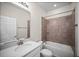 Bathroom with white cabinets, quartz countertop, tub, and tiled shower at 3848 Cabo Rojo Dr, St Cloud, FL 34772