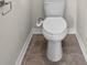 Close-up of modern white toilet with a bidet in a tiled bathroom at 3848 Cabo Rojo Dr, St Cloud, FL 34772