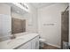 Bathroom featuring a granite countertop, and tiled shower at 3848 Cabo Rojo Dr, St Cloud, FL 34772