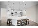 Kitchen with white cabinets, quartz countertops, and stainless steel appliances at 3848 Cabo Rojo Dr, St Cloud, FL 34772