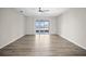 Spacious living room with sliding glass doors and view of the lake at 3848 Cabo Rojo Dr, St Cloud, FL 34772