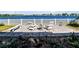 Inviting patio area with comfortable seating, perfect for enjoying the picturesque lake view and outdoor relaxation at 3848 Cabo Rojo Dr, St Cloud, FL 34772