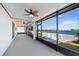 Enjoy stunning waterfront views from the screened lanai, leading to a patio with seating and a relaxing atmosphere at 3848 Cabo Rojo Dr, St Cloud, FL 34772