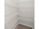 Spacious walk-in closet with white wire shelving, providing ample storage space at 3848 Cabo Rojo Dr, St Cloud, FL 34772