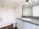 Bathroom featuring a vanity, mirror, toilet, and a shower-tub combination at 4105 Tropical Isle Blvd # 222, Kissimmee, FL 34741