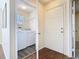 Bright laundry room featuring side by side washer and dryer and luxury vinyl plank flooring at 4105 Tropical Isle Blvd # 222, Kissimmee, FL 34741