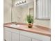 Bathroom featuring a large mirror, vanity, and ample lighting at 4726 Ormond Beach Way, Kissimmee, FL 34746