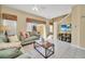 Spacious living room with patio access and modern decor at 4726 Ormond Beach Way, Kissimmee, FL 34746