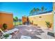 Private brick patio with lounge chairs, a table, and a view of the water at 4726 Ormond Beach Way, Kissimmee, FL 34746