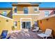 Private brick patio featuring lounge chairs, a table, and sliding glass doors to the house at 4726 Ormond Beach Way, Kissimmee, FL 34746
