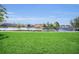 Enjoy this community's large pond, surrounding homes, and green grass at 4726 Ormond Beach Way, Kissimmee, FL 34746