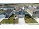 Community aerial view showing the house with a spacious backyard and surrounding neighborhood at 606 Bell Prairie Cir, Lake Wales, FL 33859
