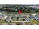 Community aerial view showing the house with a spacious backyard and surrounding neighborhood at 606 Bell Prairie Cir, Lake Wales, FL 33859