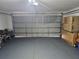 Spacious two-car garage with automatic door and ample room for storage at 633 Kangaroo Dr, Kissimmee, FL 34759