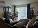 Comfortable living room showcasing stylish furniture, hardwood floors, and bright natural light at 633 Kangaroo Dr, Kissimmee, FL 34759