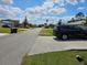 Neighborhood street showing the property's location and surrounding homes, close to area amenities and easy access at 633 Kangaroo Dr, Kissimmee, FL 34759