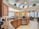 Beautiful kitchen with granite countertops, stainless steel appliances and an open layout at 802 Suffolk Pl, Davenport, FL 33896