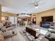 Open floor plan showcasing the living room, kitchen and dining room, perfect for entertaining at 802 Suffolk Pl, Davenport, FL 33896