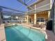 Expansive pool and patio area, perfect for soaking up the sun or cooling off in the pool at 802 Suffolk Pl, Davenport, FL 33896