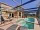 Enclosed pool and spa area with multiple seating options, perfect for relaxation and entertainment at 802 Suffolk Pl, Davenport, FL 33896