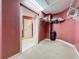Walk-in closet with shelves and hanging space leading to the ensuite bathroom at 802 Suffolk Pl, Davenport, FL 33896