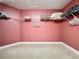 Empty walk-in closet with ample shelving and storage space, ready to be organized at 802 Suffolk Pl, Davenport, FL 33896