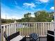 Outdoor balcony featuring furniture, a relaxing space, and water views at 8517 Crystal Cove Loop, Kissimmee, FL 34747