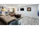 Spacious living room with recessed lighting, hardwood style floors, and comfortable seating at 876 Lobster Ct, Kissimmee, FL 34744