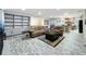 Spacious living room with comfortable seating, built-in shelving and an open layout at 876 Lobster Ct, Kissimmee, FL 34744