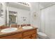 Functional bathroom with double sinks, a large mirror, and ample counter space at 917 Orange Cosmos Blvd, Davenport, FL 33837