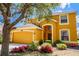 Charming home featuring a two-car garage and well-manicured landscaping at 917 Orange Cosmos Blvd, Davenport, FL 33837