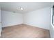 Bright bedroom with white walls and neutral carpet at 9916 Jackson Rd, Leesburg, FL 34788