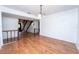 Bright dining area featuring wood floors and an open floorplan at 9916 Jackson Rd, Leesburg, FL 34788
