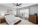 Bright bedroom features large windows, and simple decor, creating a relaxing and inviting space at 10986 Ledgement Ln, Windermere, FL 34786